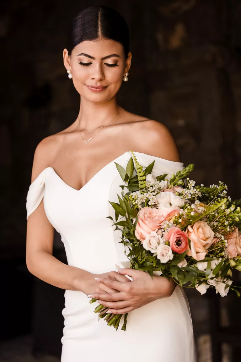 bride-holding-bouquet-smiling